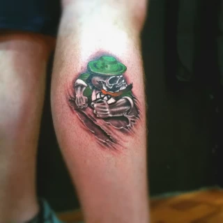 Leprechaun Tattoo on leg - Irish & Celtic Tattoo - Black Hat Tattoo Dublin - The Black Hat Tattoo