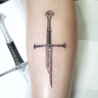 Sword tattoo - Realism, Microrealism and Portrait Tattoo - Black Hat Tattoo Dublin - The Black Hat Tattoo