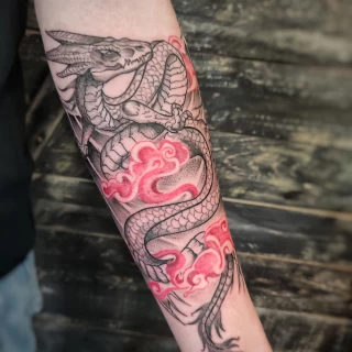 Dragon and sakura flowers tattoo - Color Watercolor and Sketch Tattoos - Black Hat Tattoo Dublin - The Black Hat Tattoo
