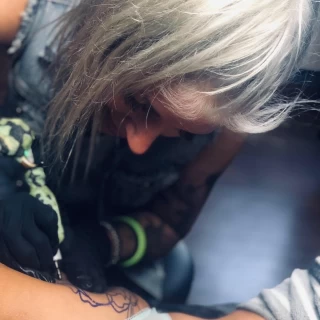 Szabrina - The Black Hat Tattoo