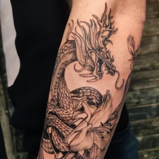 Dragon Tattoo on arm -  - Blackwork Darkwork - Black Hat Tattoo Dublin - The Black Hat Tattoo