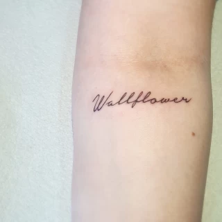 Wallflower tattoo script - Script Quote Tattoo - Black Hat Tattoo Dublin - The Black Hat Tattoo
