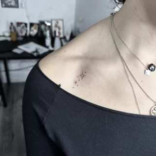 small neck tattoo - Small Tattoo idea - Black Hat Tattoo Dublin - The Black Hat Tattoo